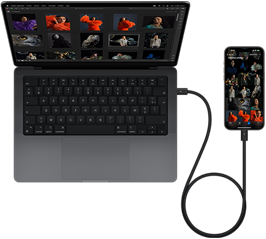 Un iPhone 15 Pro Max connecté à un MacBook Pro 14 pouces via USB-C